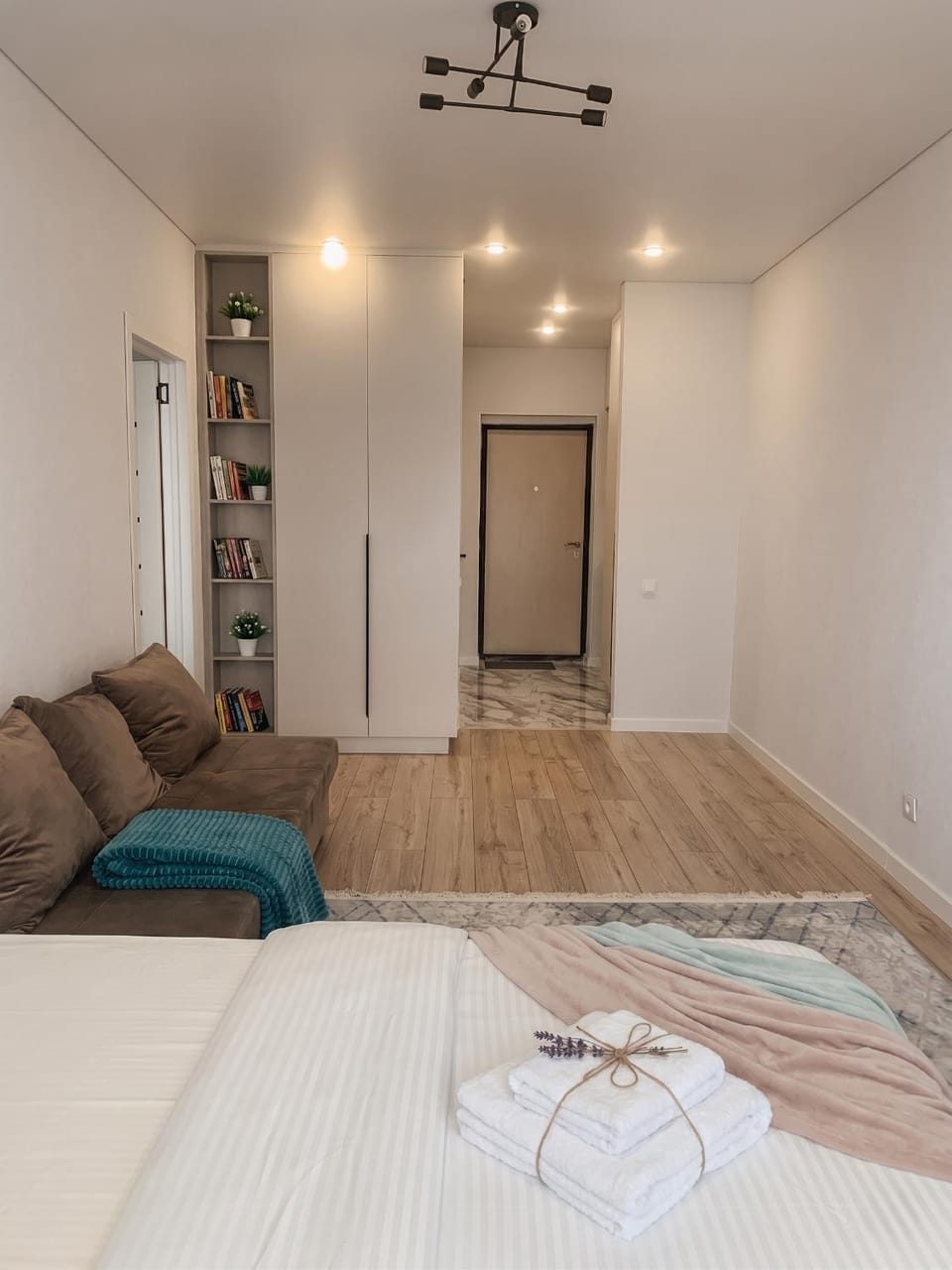 Bed, Living room, Photo of the whole room, Seating area, Bedroom, towels, wardrobe