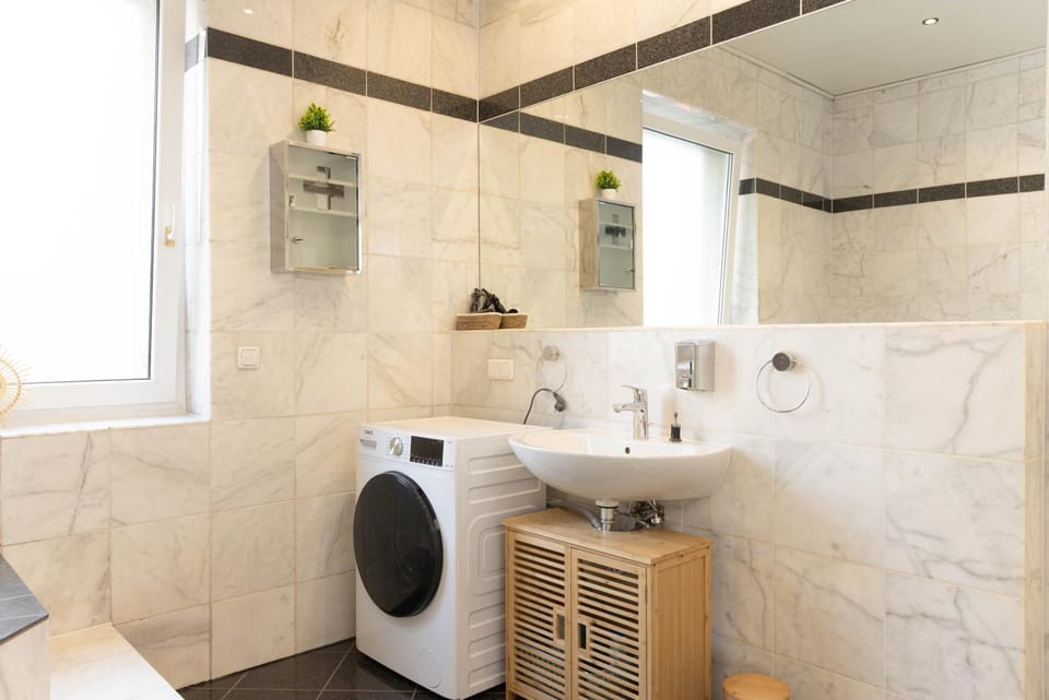 Bathroom, hair dryier, washing machine, dryer