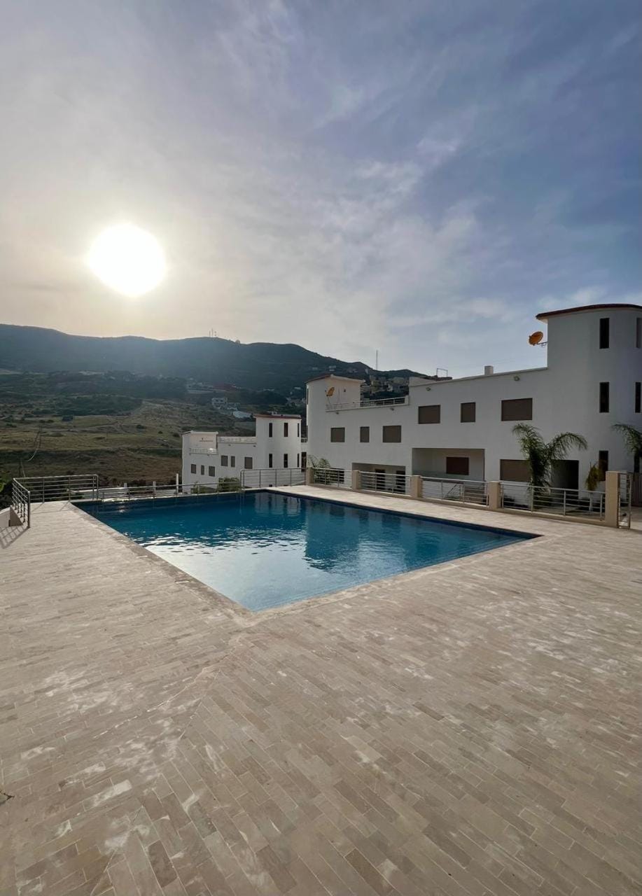 Property building, Day, Natural landscape, Mountain view, Pool view, Swimming pool, Swimming pool, sunbed