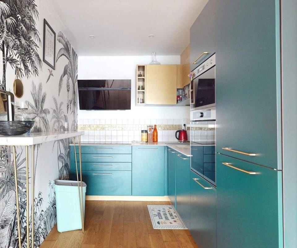 Kitchen or kitchenette, dishwasher, oven, stove