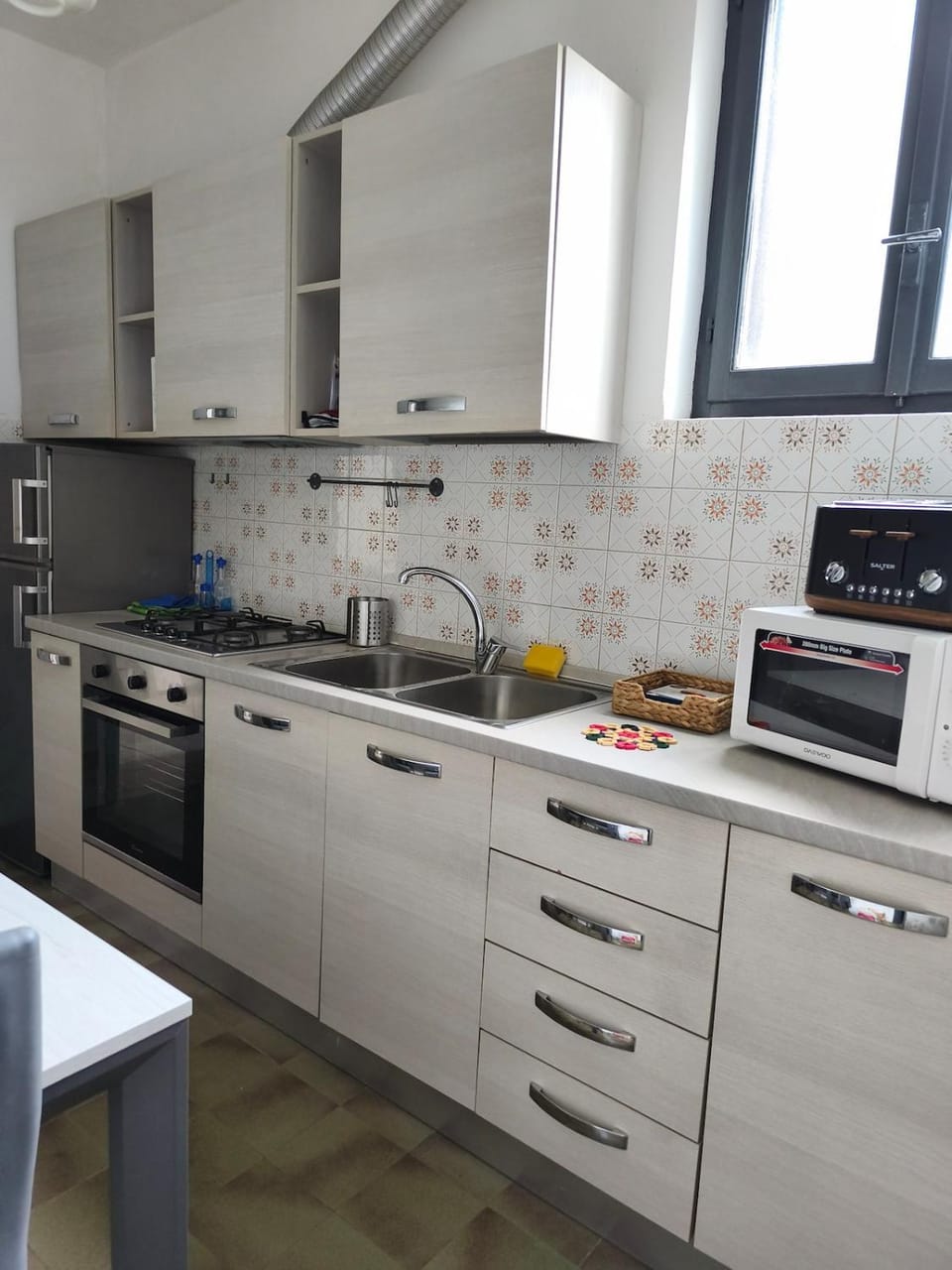 Kitchen or kitchenette, stove, toaster