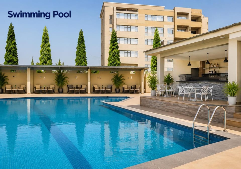 Property building, Day, Text overlay, Pool view, Swimming pool, sunbed