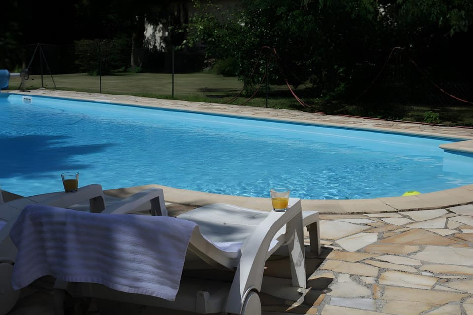 Property building, Living room, Swimming pool