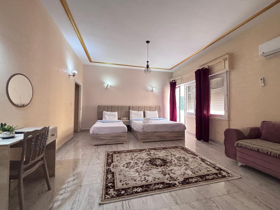 Bed, Living room, Photo of the whole room, Seating area, Bedroom, towels, air conditioner