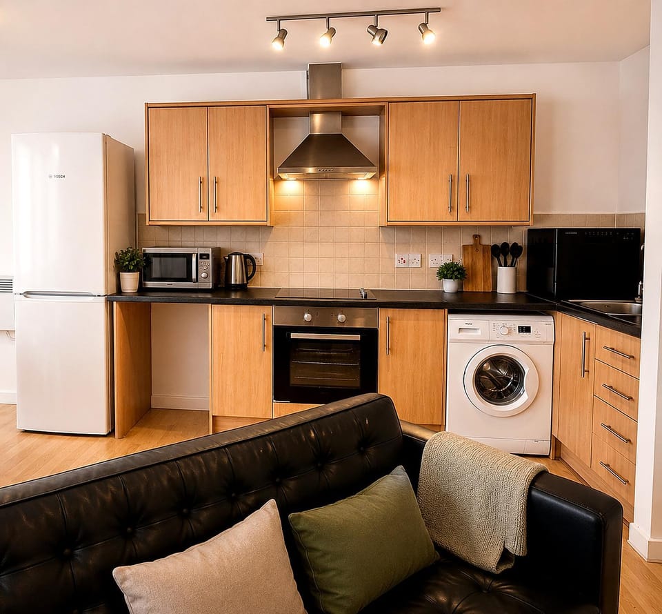 Kitchen or kitchenette, Living room, Seating area, dishwasher, oven, stove, washing machine