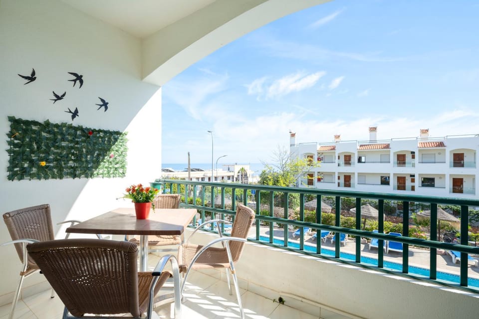 Balcony/Terrace, Seating area, Pool view, Sea view