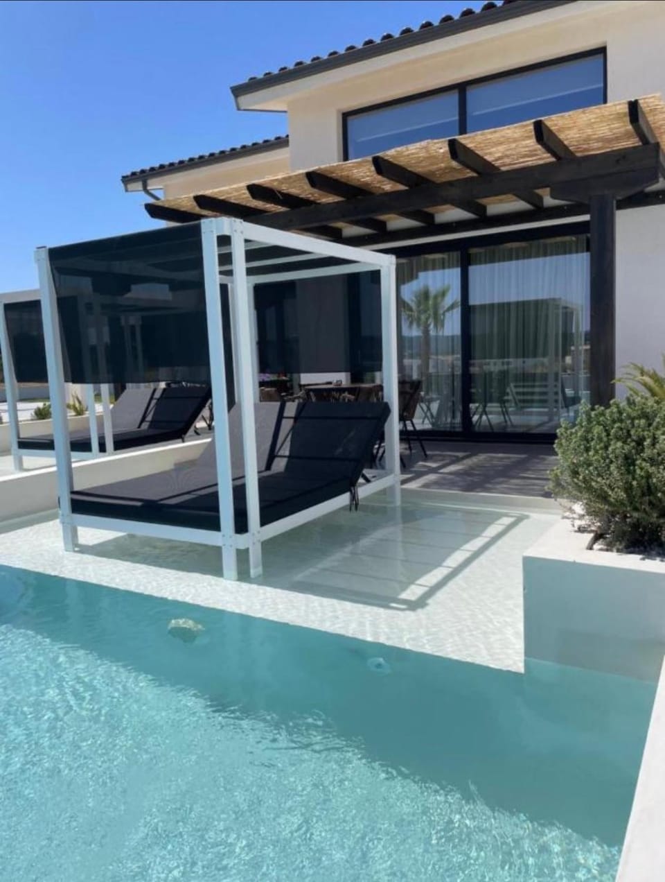 Property building, Pool view, Swimming pool, sunbed