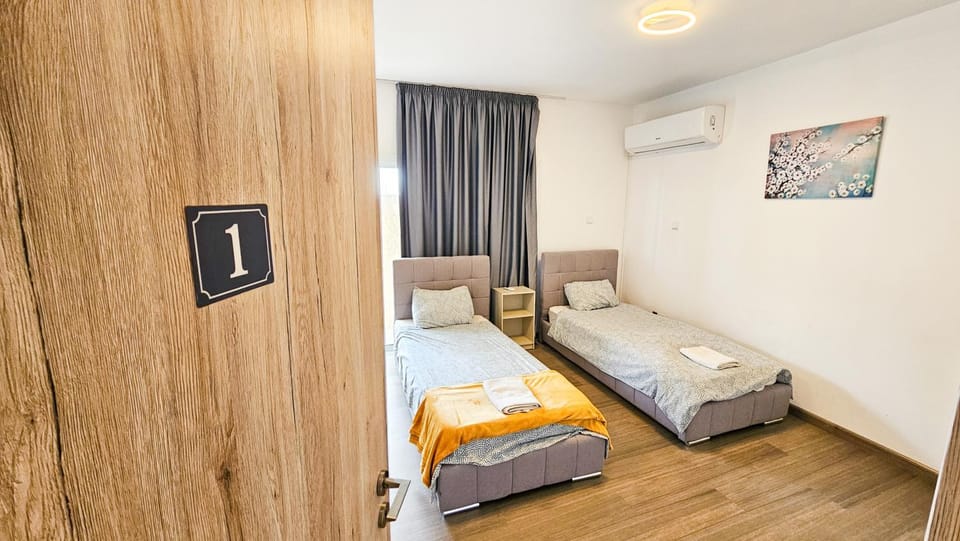 Bed, Bedroom, towels, wardrobe, air conditioner