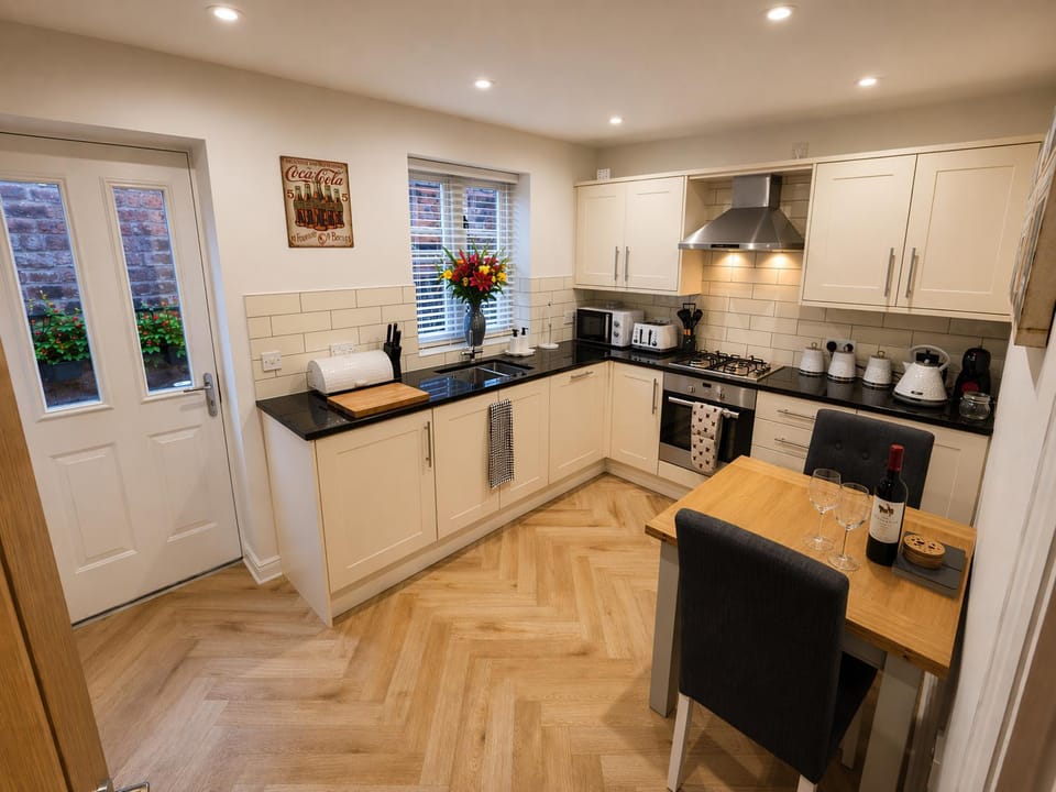 Kitchen or kitchenette, Dining area, dishwasher, oven, stove, toaster