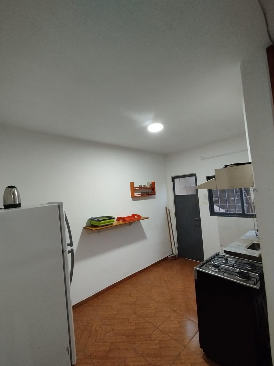 Kitchen or kitchenette, oven