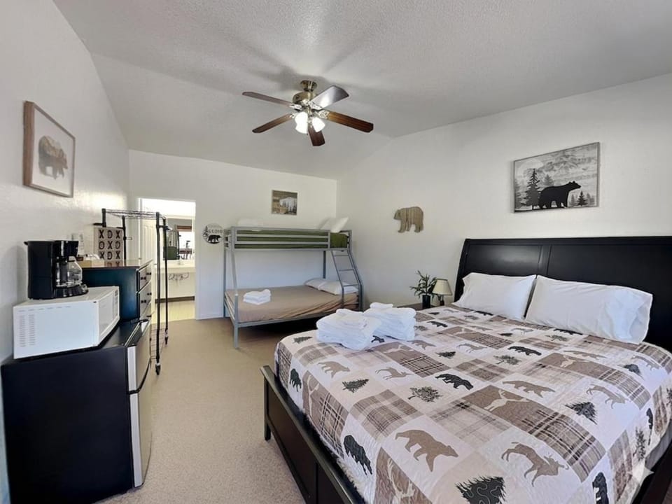 Bed, Kitchen or kitchenette, Bedroom, bunk bed, furniture, microwave, towels