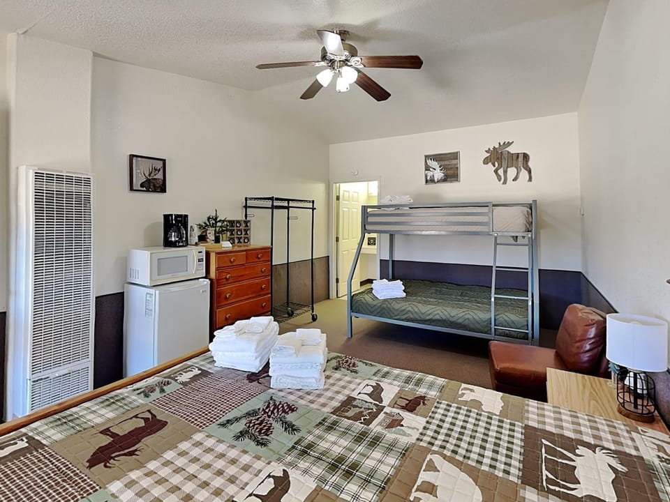 Bed, bunk bed, furniture, microwave, towels