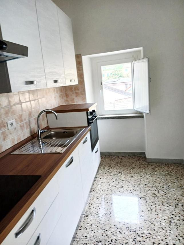 Kitchen or kitchenette, stove