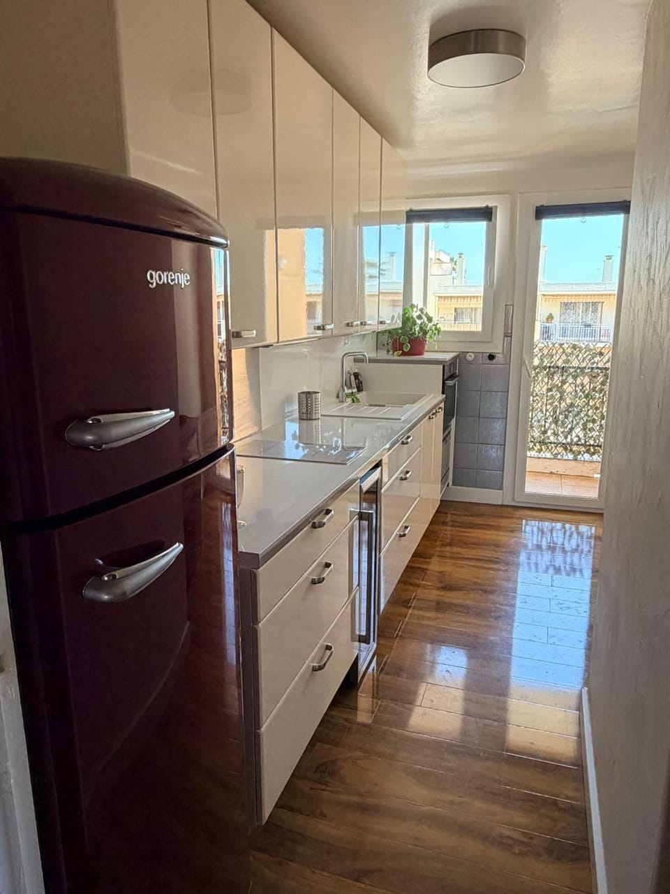 Kitchen or kitchenette, dishwasher, oven, stove