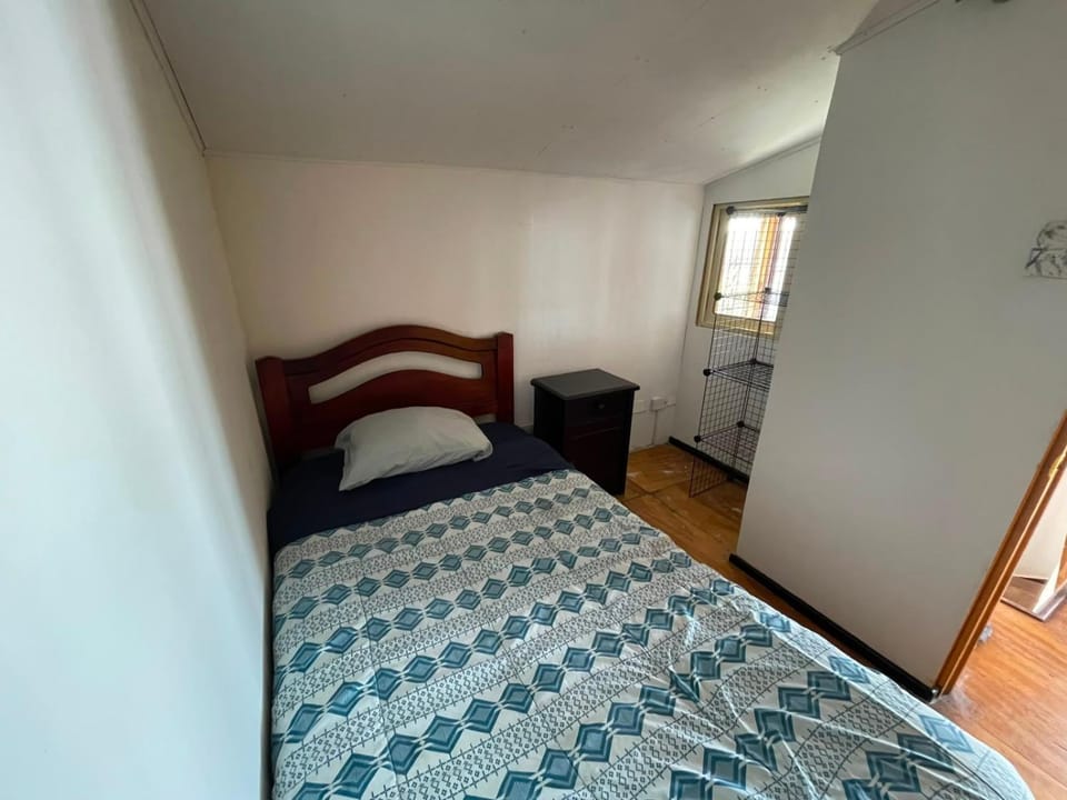 Bed, Photo of the whole room, Bedroom, hair dryier, towels