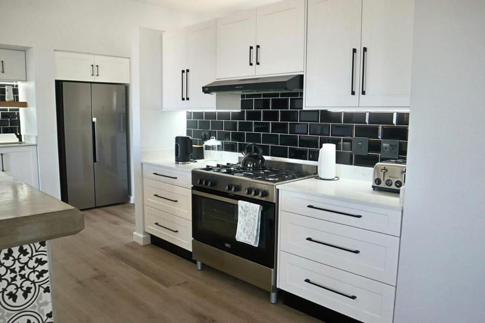 Kitchen or kitchenette, oven, stove