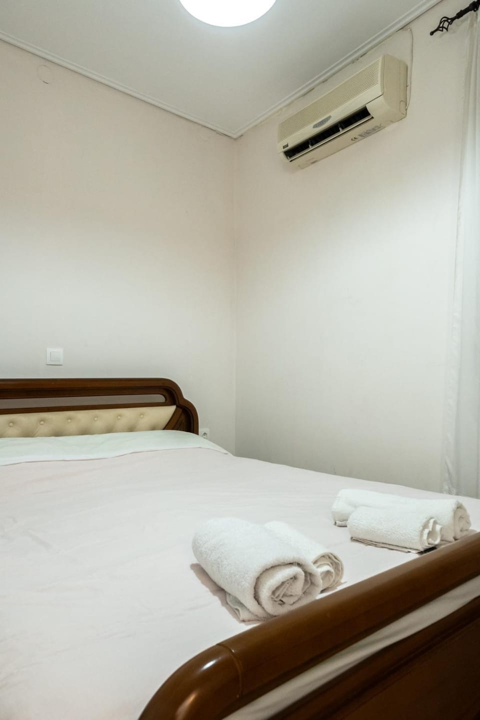 Bed, Photo of the whole room, Bedroom, towels, air conditioner