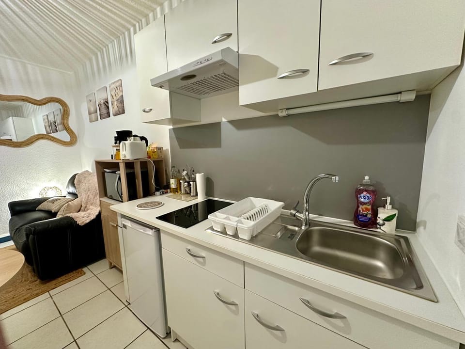 Kitchen or kitchenette, stove