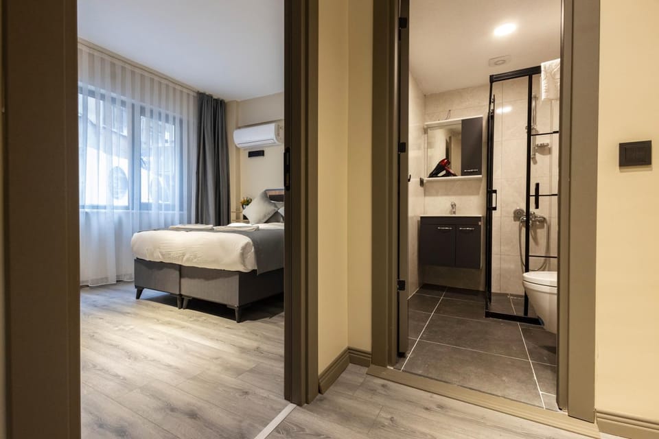 Toilet, Bed, Bathroom, Photo of the whole room, Bedroom, towels, wardrobe