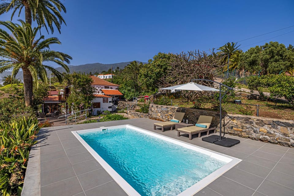 Property building, Living room, Swimming pool