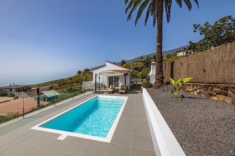 Property building, Living room, Swimming pool