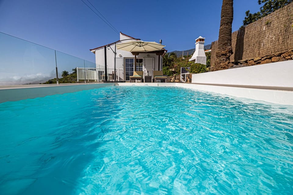 Property building, Living room, Swimming pool