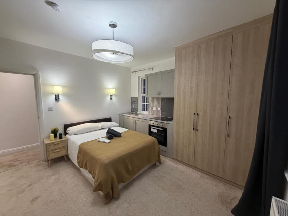 Bed, Kitchen or kitchenette, Bedroom, oven, wardrobe