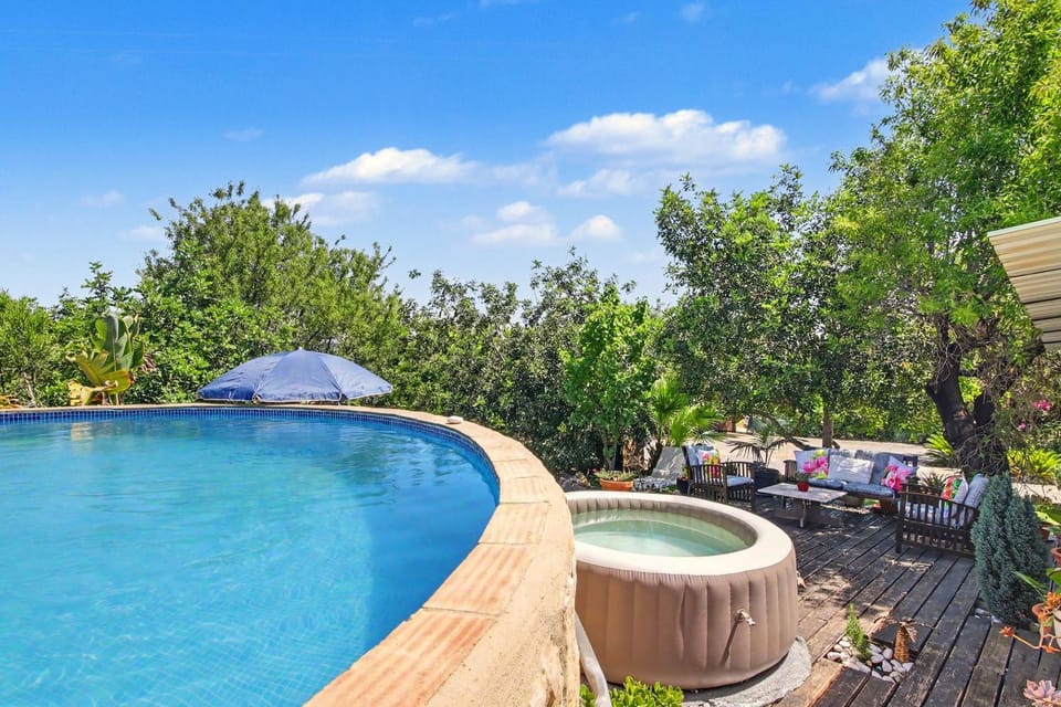 Property building, Living room, Swimming pool