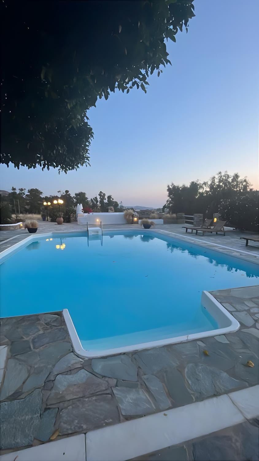 Property building, Living room, Swimming pool