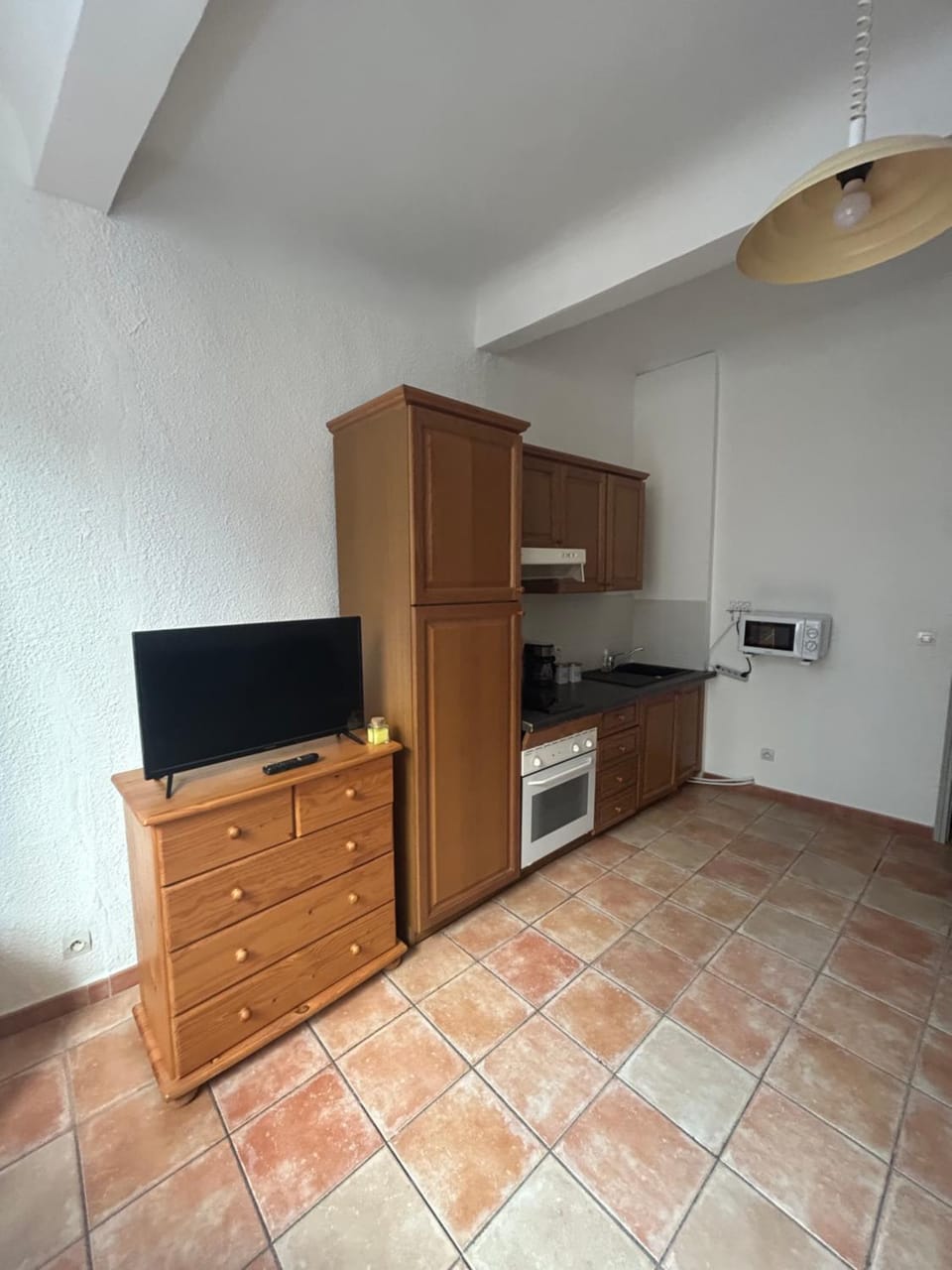 Kitchen or kitchenette, oven, stove