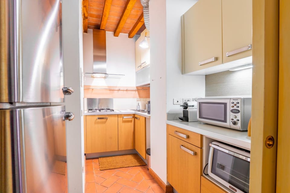 Kitchen or kitchenette, stove, toaster