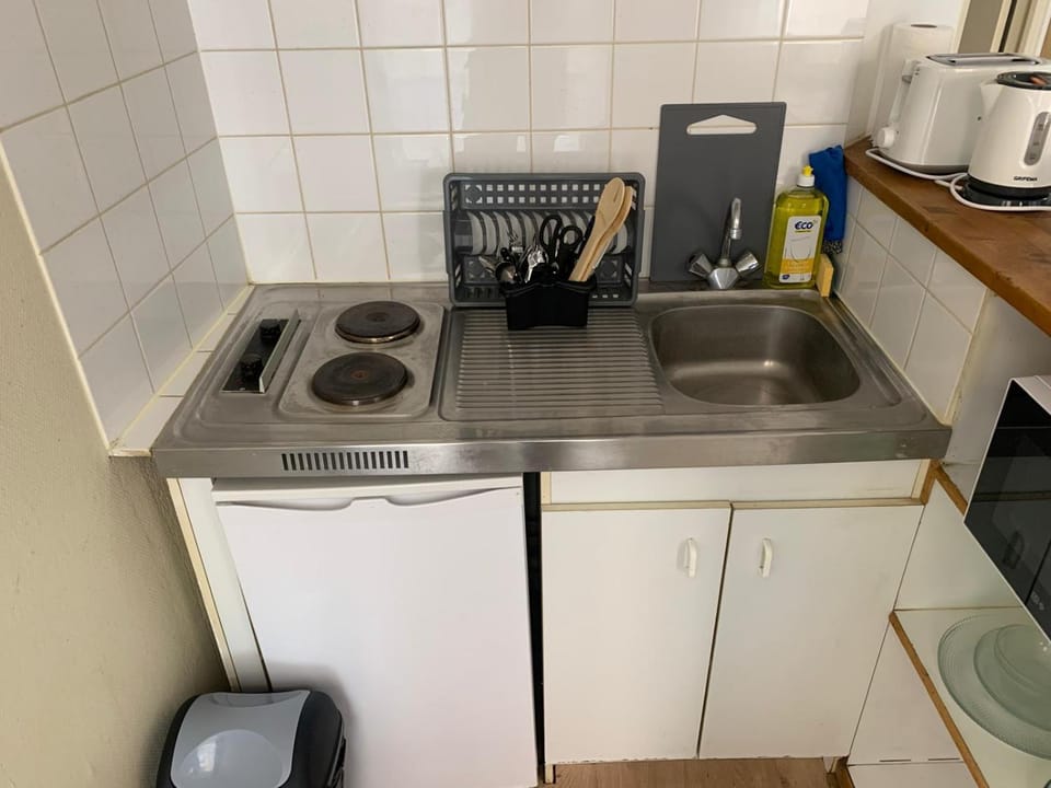 Studio cosy, 2 min à pied du métro 7, accès direct Paris Apartment in Île-de-France