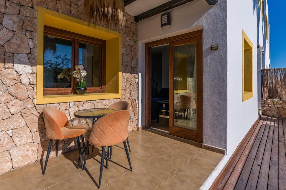 Property building, Patio, Living room, Dining area
