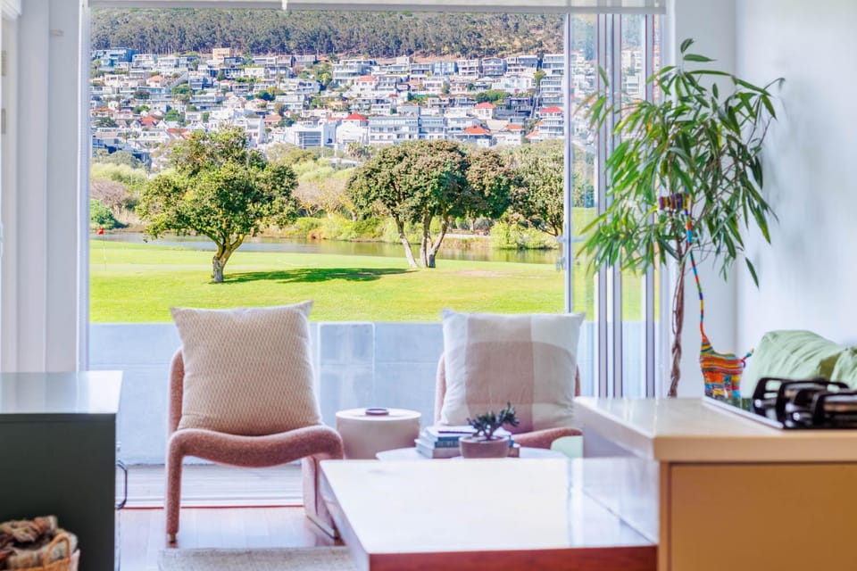 View (from property/room), Living room, Seating area, City view, Garden view