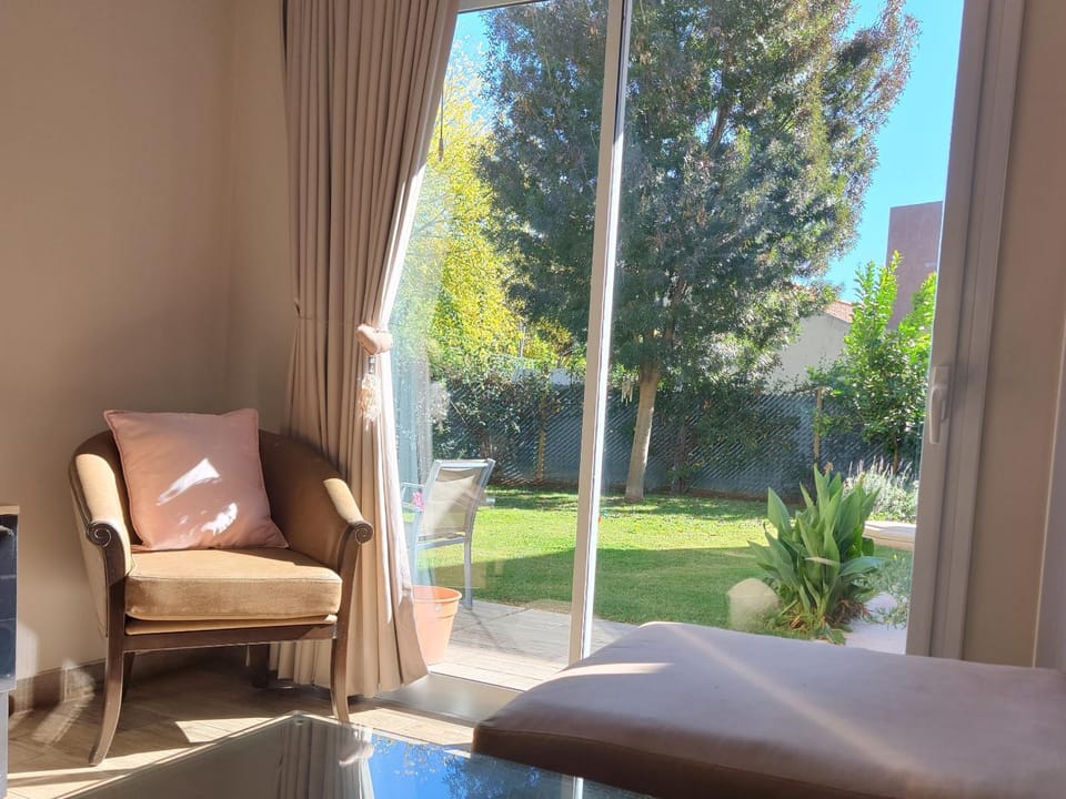 Living room, Seating area, Garden view