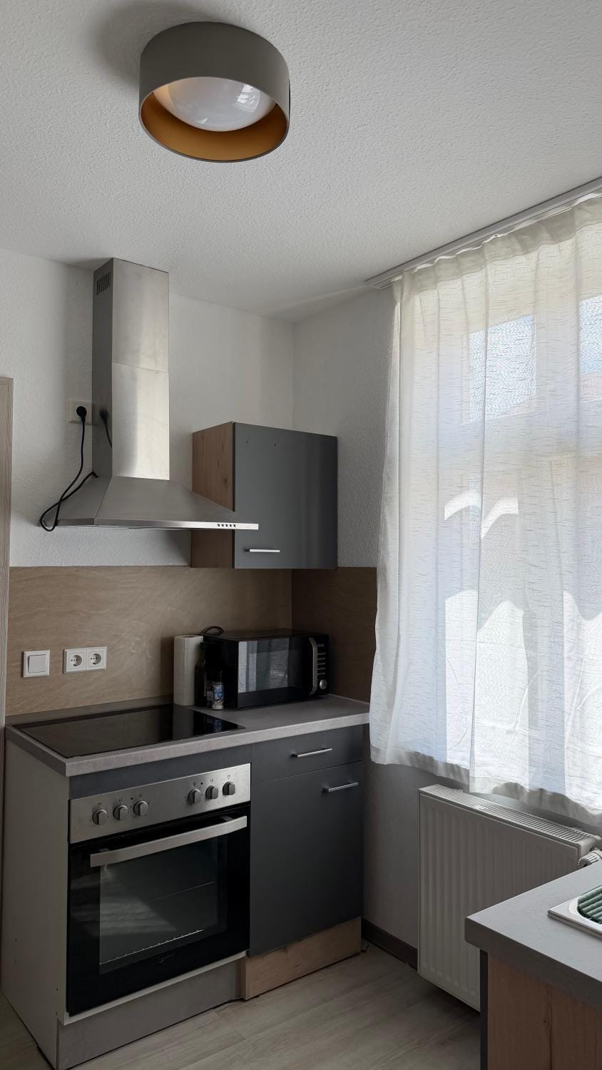 Kitchen or kitchenette, stove