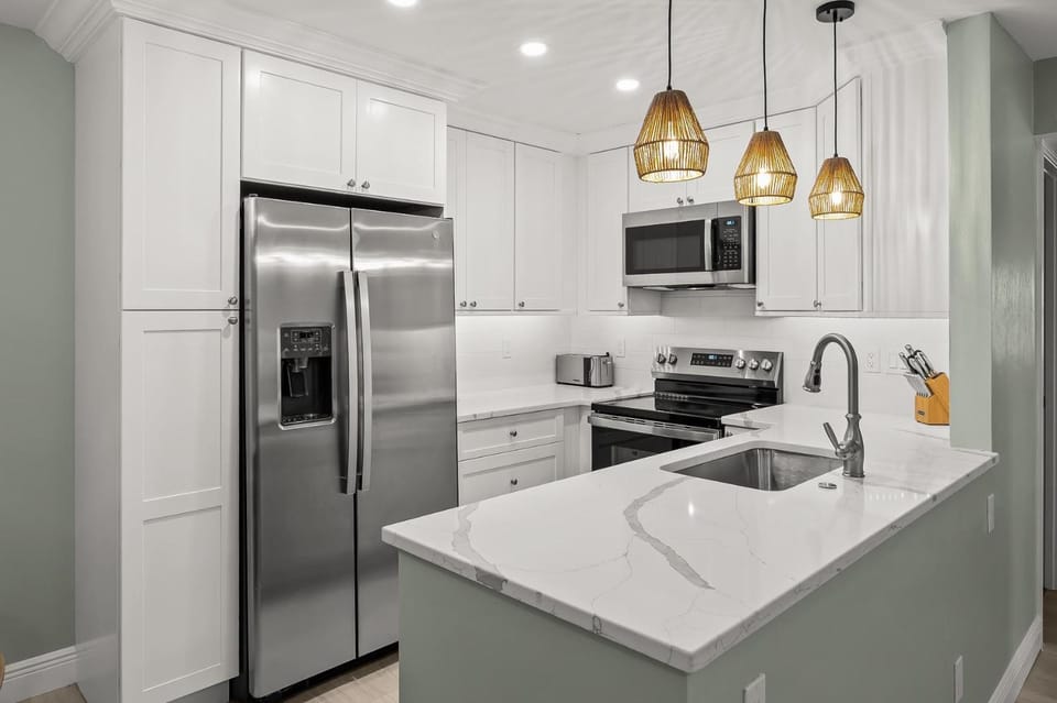 #1121 Sanibel Moorings Gulf Front House in Sanibel Island