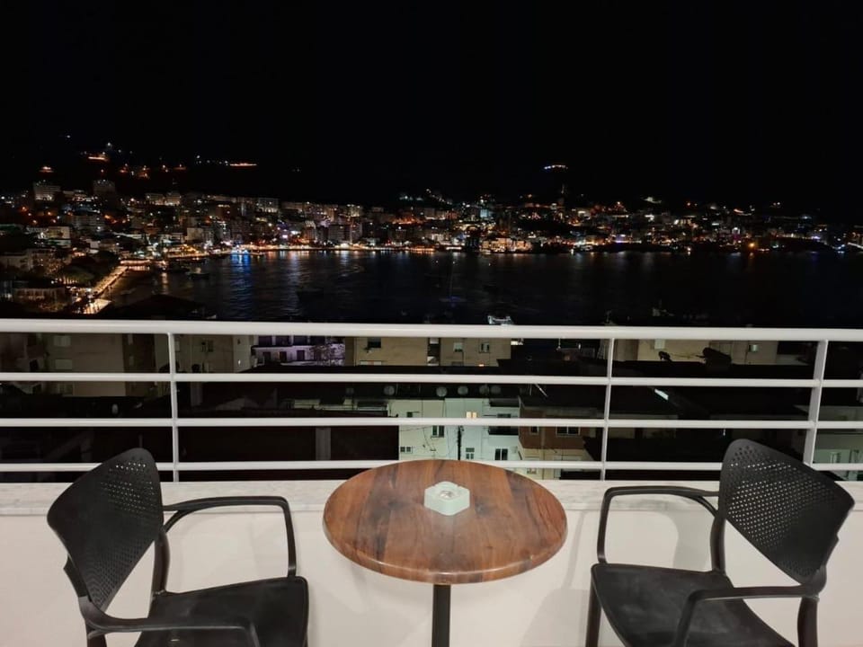 Night, View (from property/room), Balcony/Terrace, Seating area, City view, Sea view
