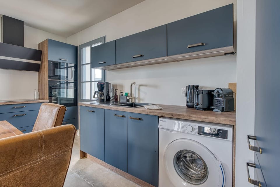 Kitchen or kitchenette, dishwasher, oven, pet friendly, stove, toaster, washing machine, dryer
