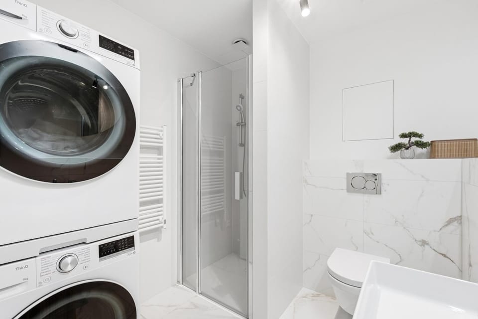 Shower, Toilet, Bathroom, towels, washing machine, dryer