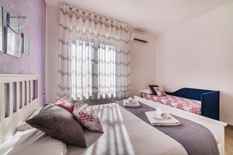 Bed, Photo of the whole room, Bedroom, towels, air conditioner