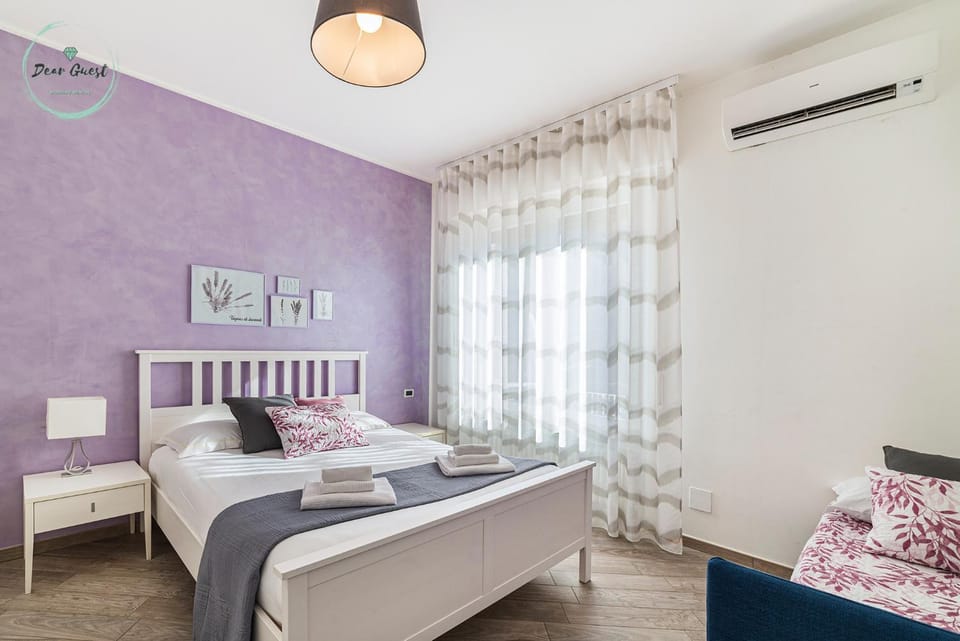 Bed, Photo of the whole room, Bedroom, towels, air conditioner