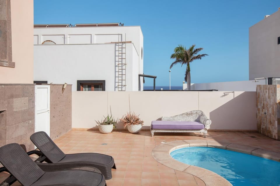 Property building, Living room, Swimming pool