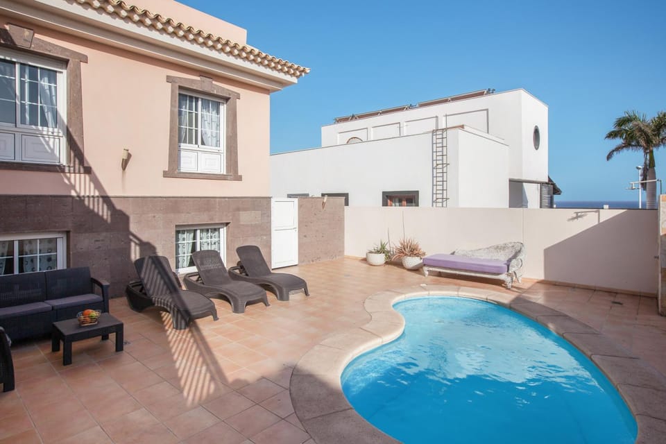 Property building, Living room, Swimming pool