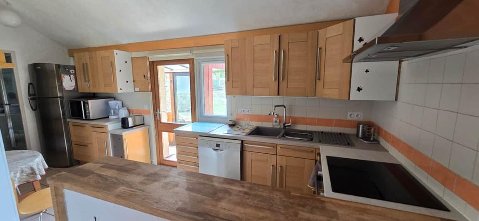 Kitchen or kitchenette, dishwasher, oven, stove, toaster