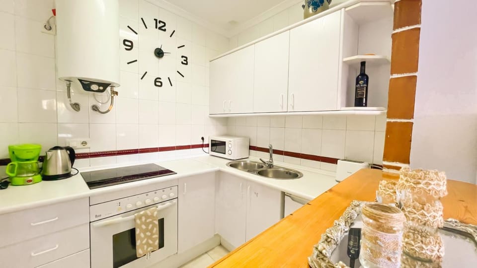 Kitchen or kitchenette, oven, stove