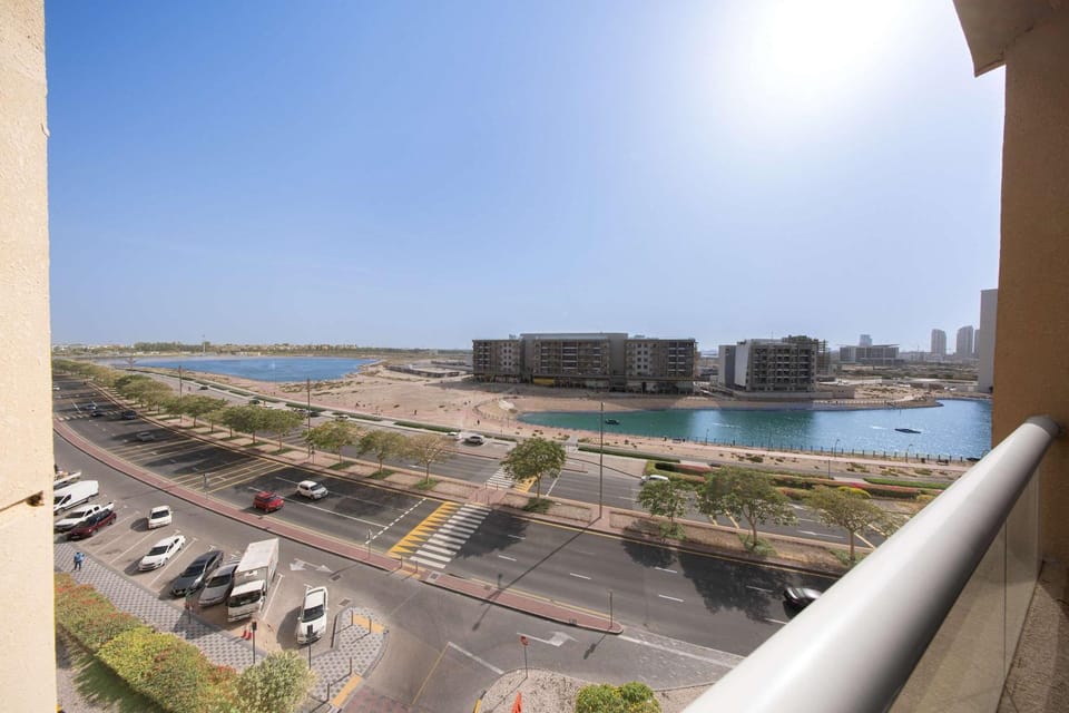 Free housekeeping visits during your stay - StayShort - Comfortable 1 Bedroom in Production City that Sleeps 3 Apartment in Dubai