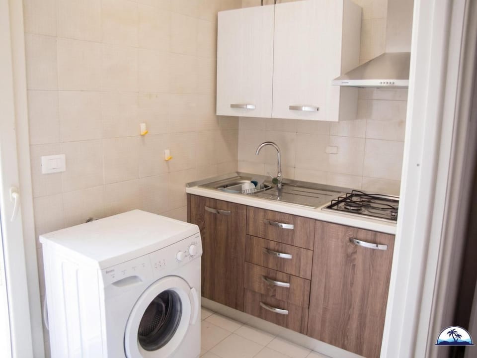 Kitchen or kitchenette, washing machine