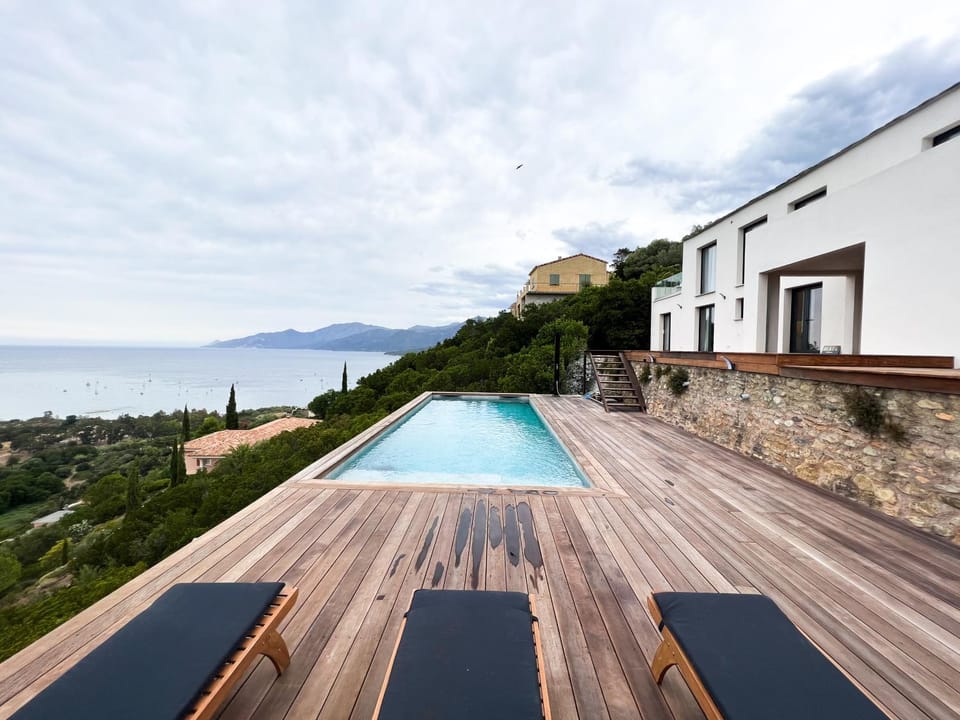 Property building, Natural landscape, Pool view, Swimming pool, sunbed