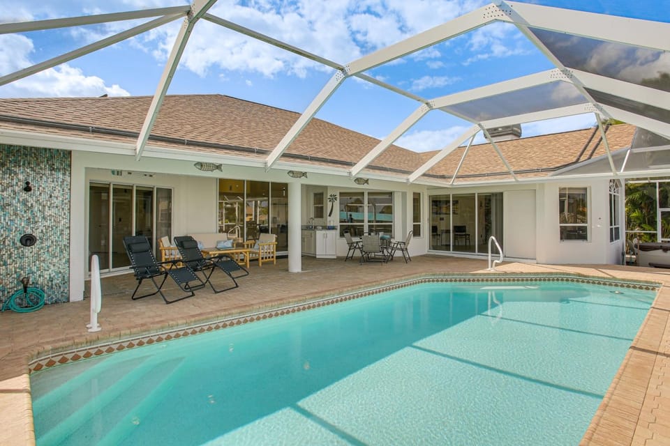 Waterfront Pool Home by Park Pickleball Sleeps 10 House in Cape Coral